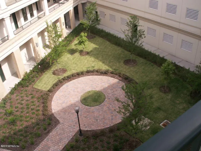 a view of city with tall buildings