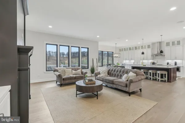 a living room with furniture and a table