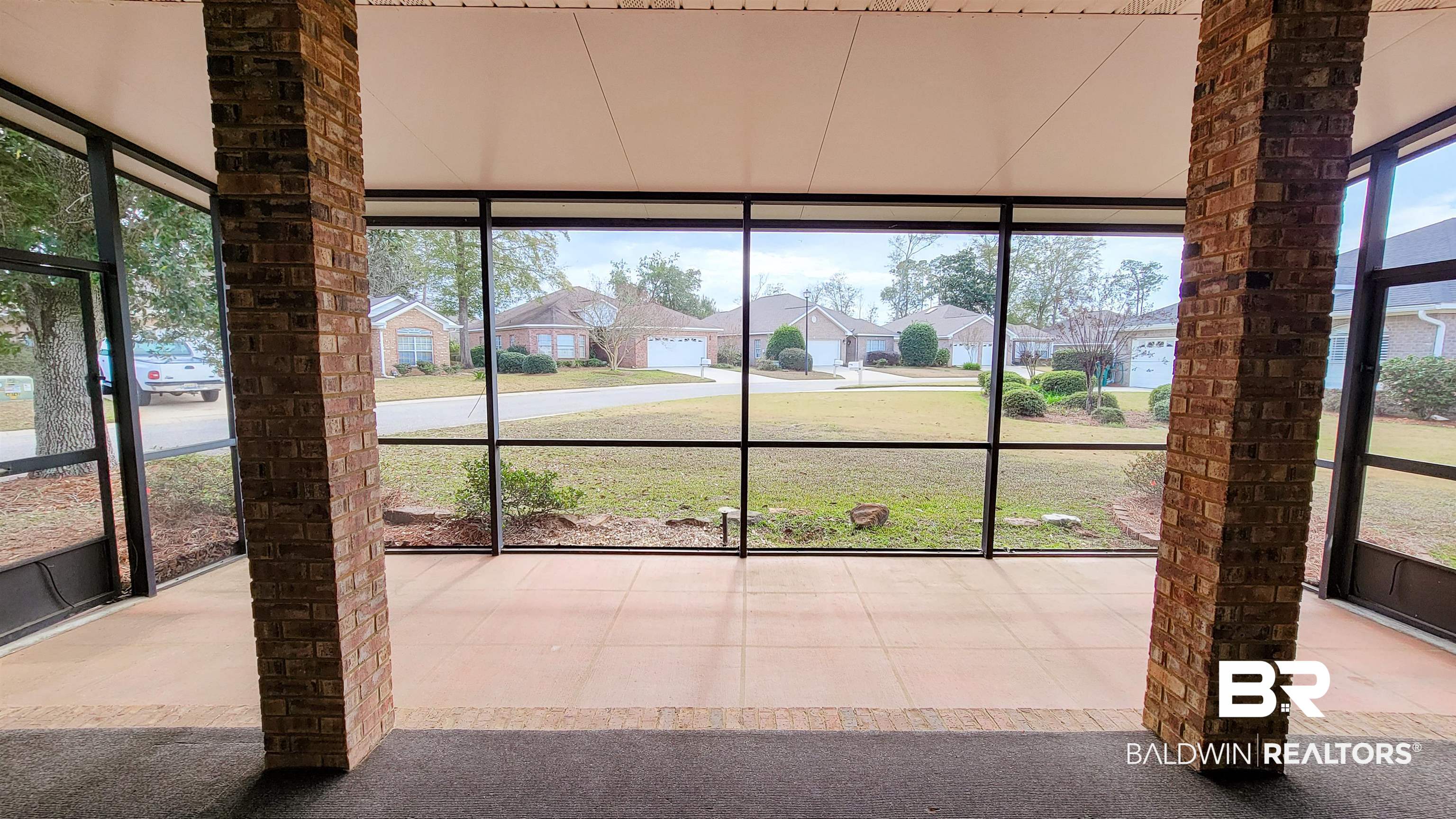 214 Hemingway Loop Foley, AL 36535 - Photo 35 of 67 Unfurnished sunroom featuring a residential view