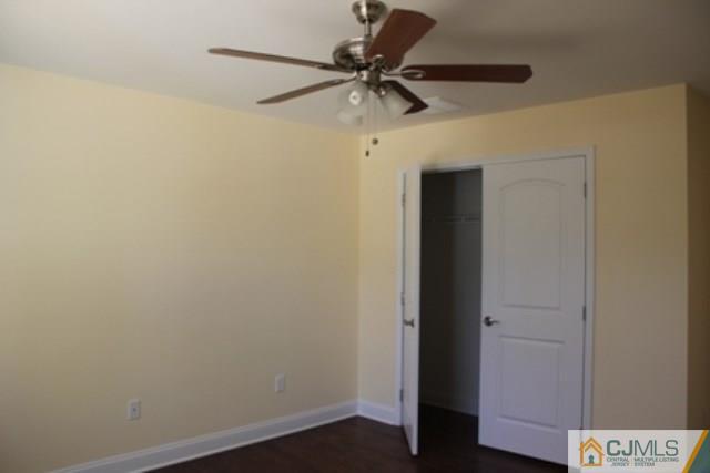 4 Herron Road Edison, NJ 08820 - Photo 13 of 25 a view of hallway with wooden floor