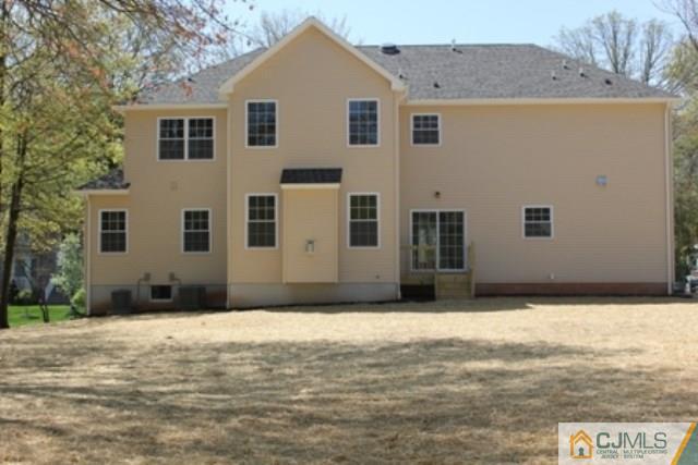 4 Herron Road Edison, NJ 08820 - Photo 25 of 25 a front view of a house with a yard