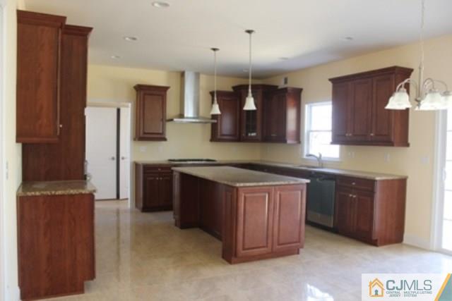 4 Herron Road Edison, NJ 08820 - Photo 7 of 25 a kitchen with stainless steel appliances granite countertop a sink and a refrigerator