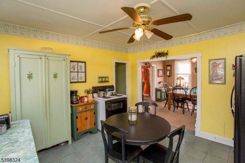 47 Hewitt Road Stockton, NJ 08559 - Photo 18 of 31 a dining room with stainless steel appliances furniture stove and refrigerator