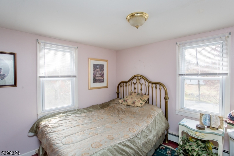 47 Hewitt Road Stockton, NJ 08559 - Photo 21 of 31 a bedroom with a bed and a window