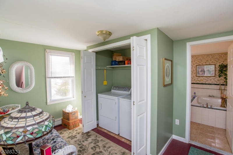 47 Hewitt Road Stockton, NJ 08559 - Photo 22 of 31 a bedroom with furniture and a window