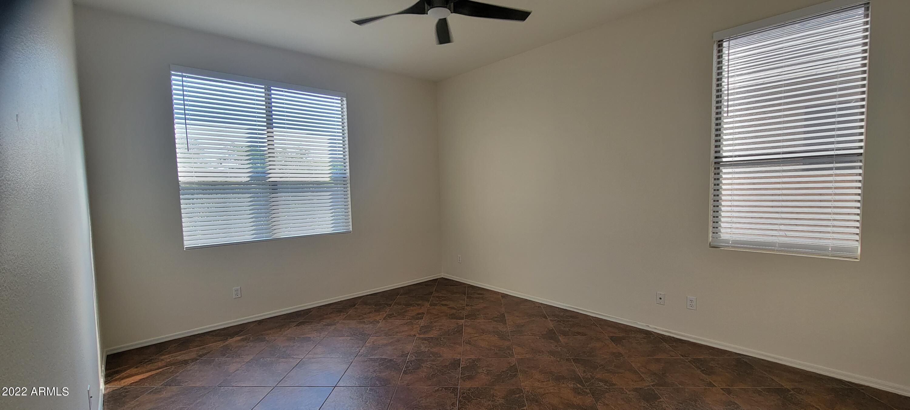 7323 East Overlook Drive Scottsdale, AZ 85255 - Photo 14 of 28 an empty room with a window