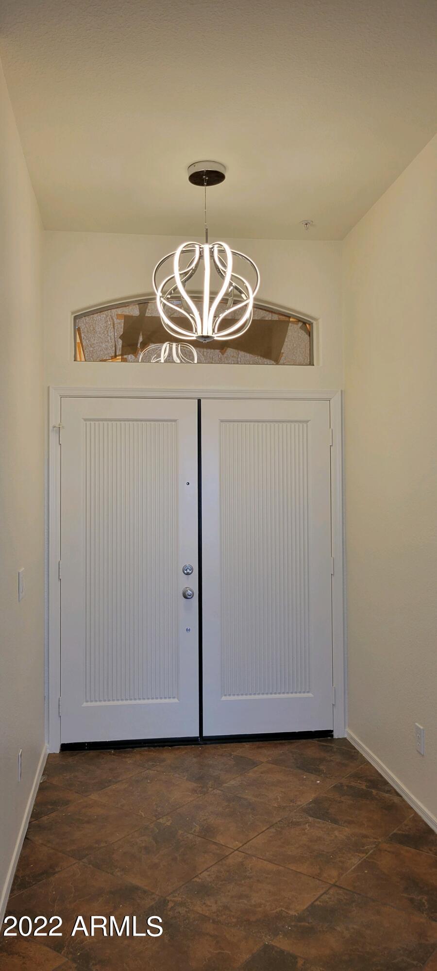 7323 East Overlook Drive Scottsdale, AZ 85255 - Photo 3 of 28 a view of kitchen island with wooden floor