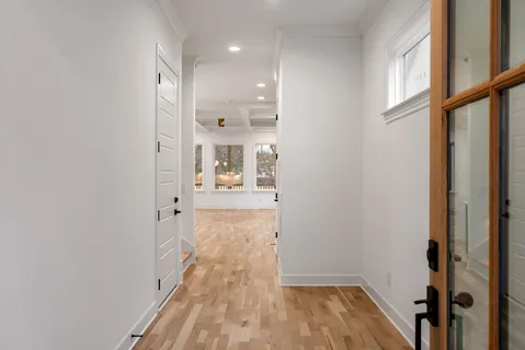 a kitchen with a refrigerator and a sink