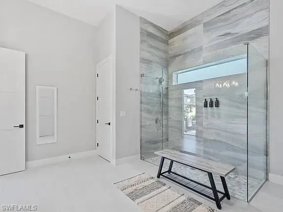 a spacious bathroom with a shower