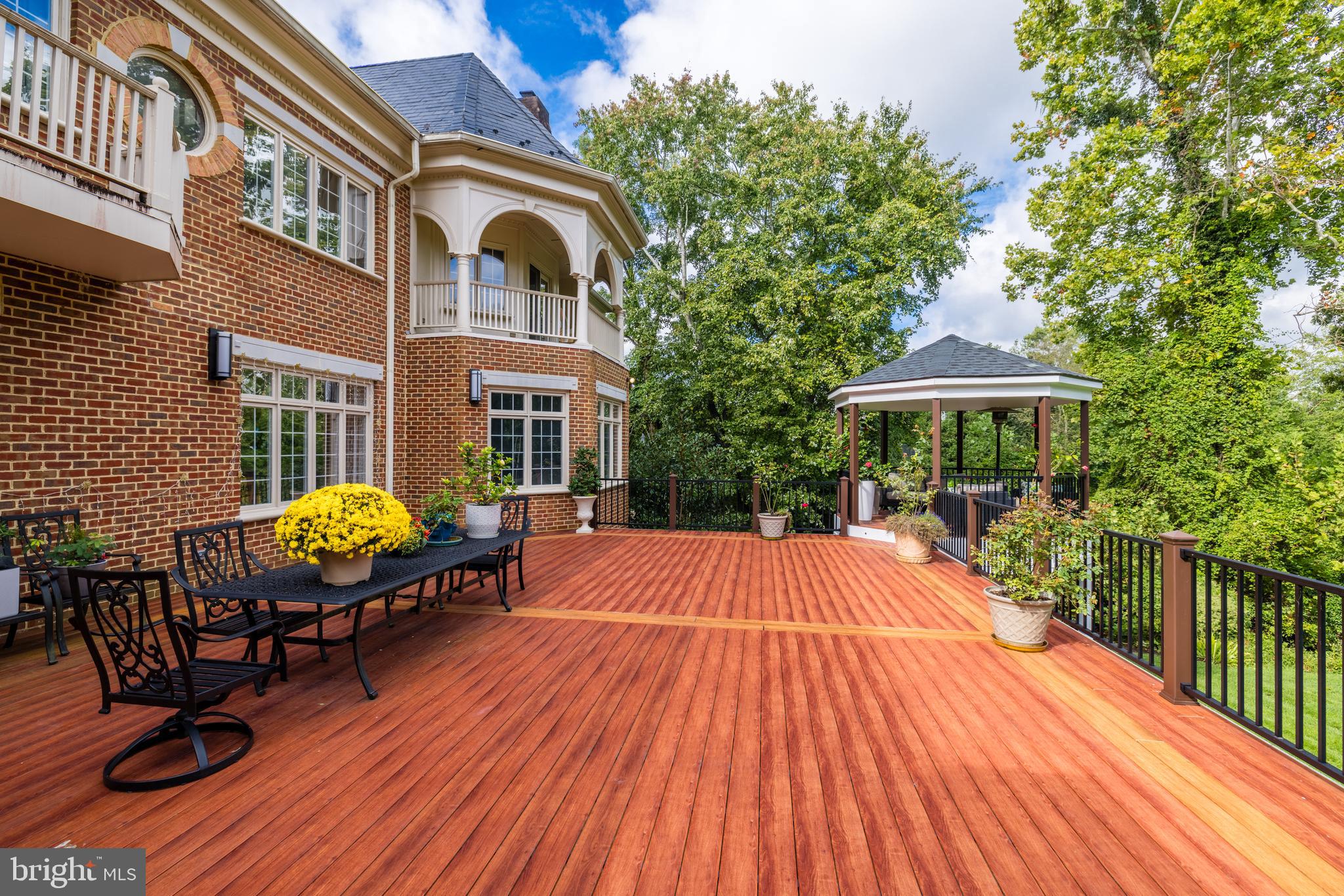 6832 Georgetown Pike McLean, VA 22101 - Photo 13 of 25 a backyard of a house with seating space