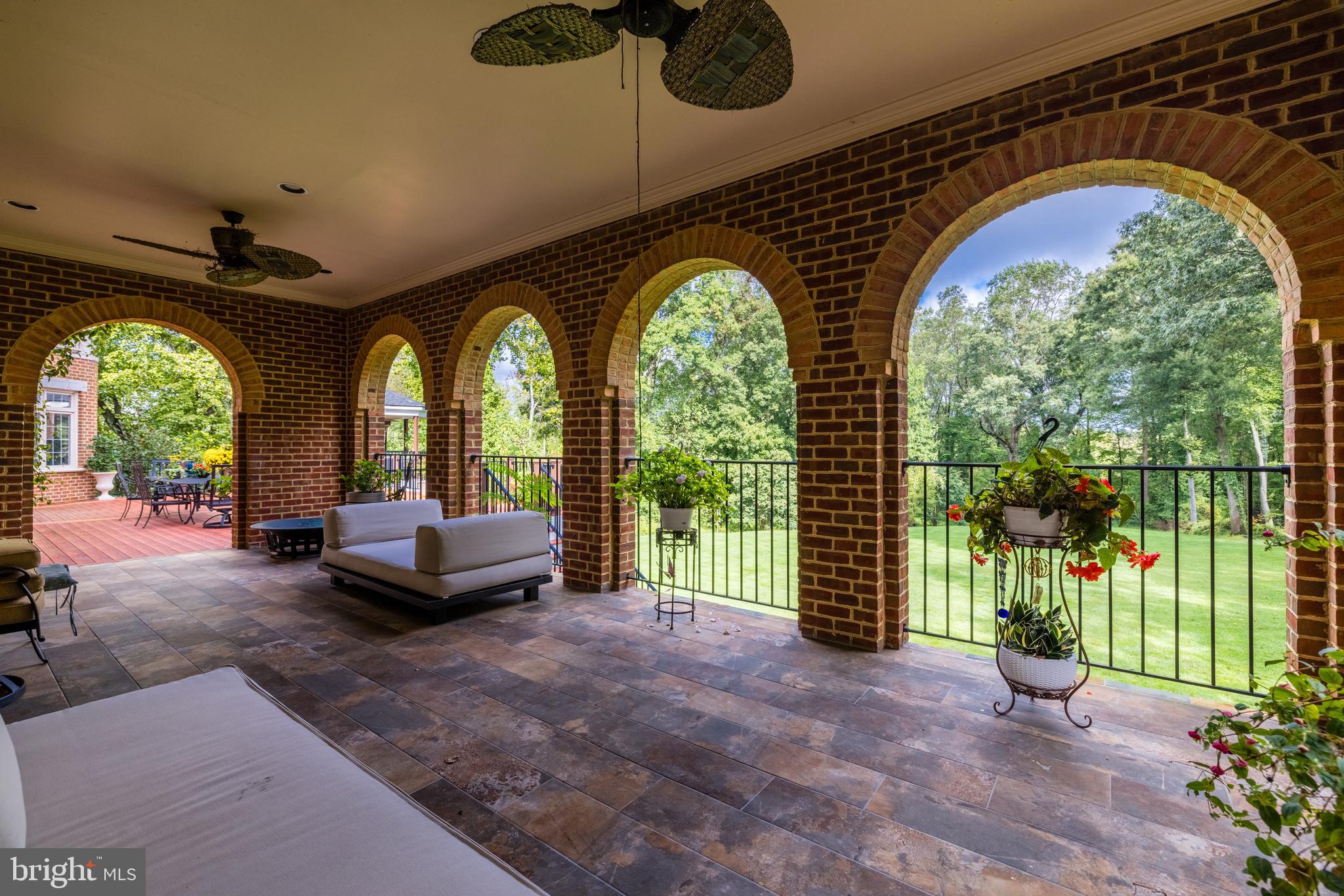 6832 Georgetown Pike McLean, VA 22101 - Photo 14 of 25 a view of swimming pool with outdoor seating and garden