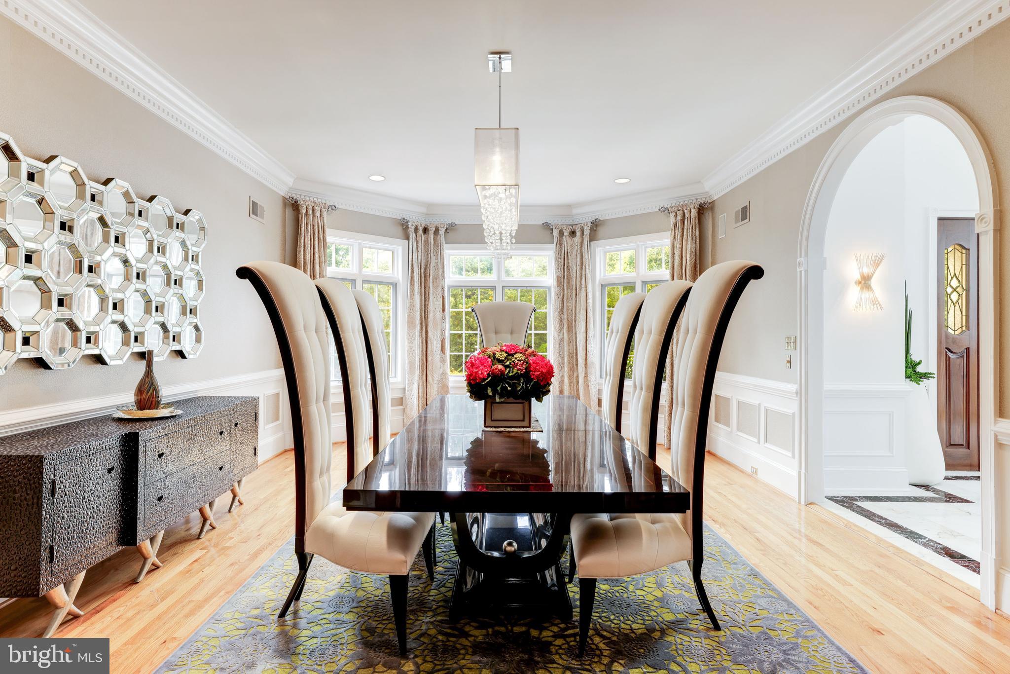 6832 Georgetown Pike McLean, VA 22101 - Photo 6 of 25 a view of a dining room with furniture window and wooden floor