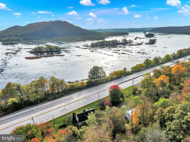 a view of a room with window and stairs
