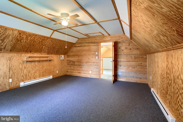 a room with furniture and a large window