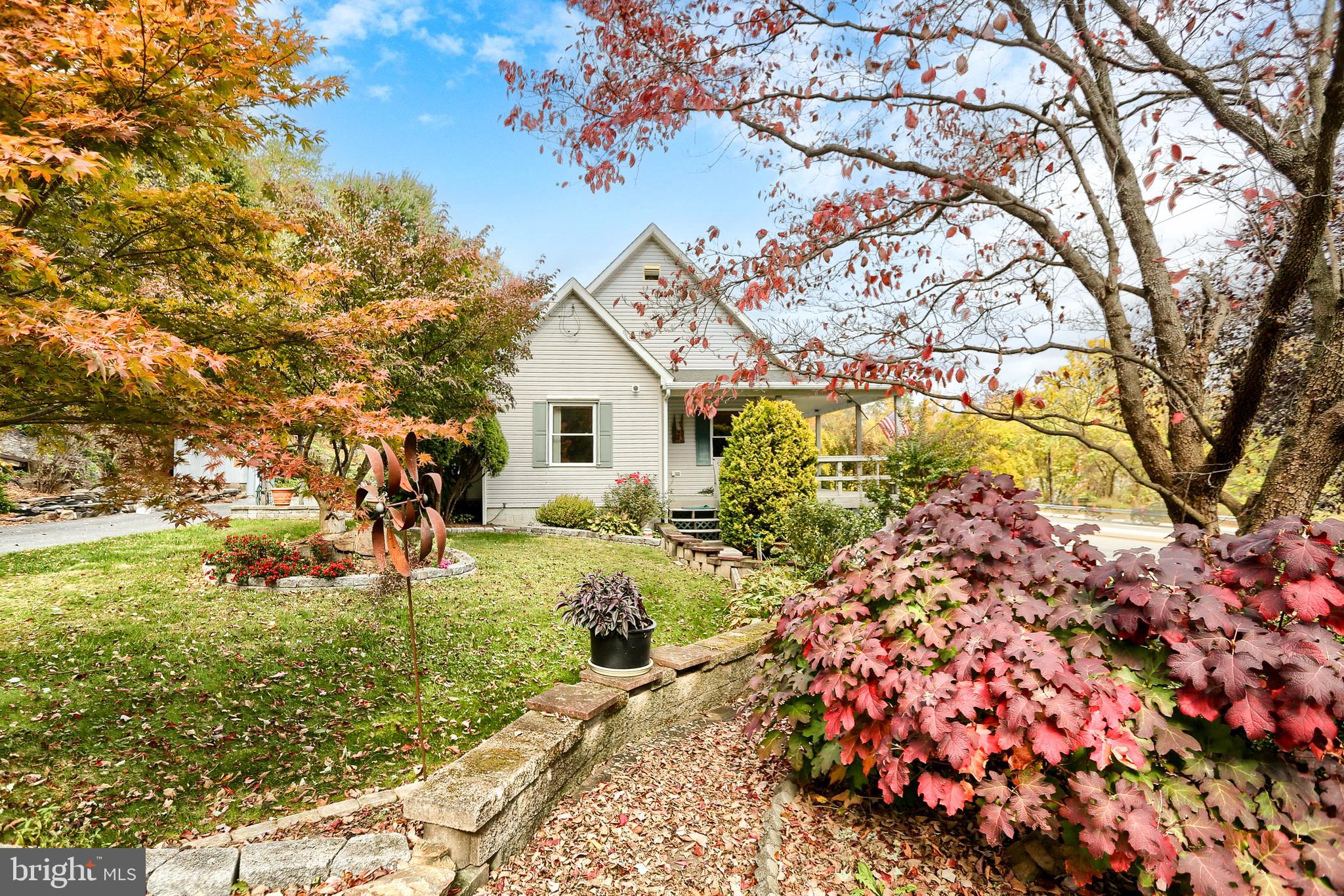 2130 Susquehanna Trail Liverpool, PA 17045 - Photo 5 of 54 a front view of a house with a yard and fountain