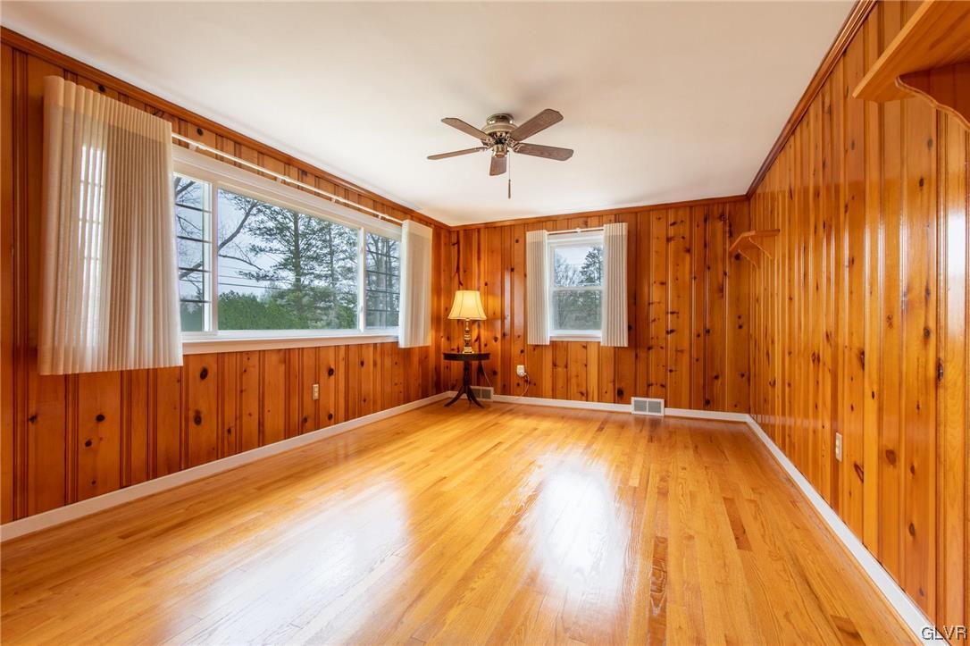 330 Wedgewood Road Bethlehem, PA 18017 - Photo 22 of 47 a view of an empty room with a window and wooden floor