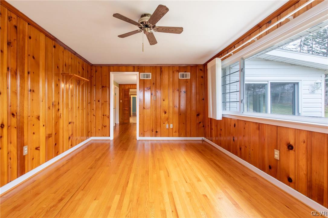 330 Wedgewood Road Bethlehem, PA 18017 - Photo 23 of 47 a view of an empty room with a window and wooden floor