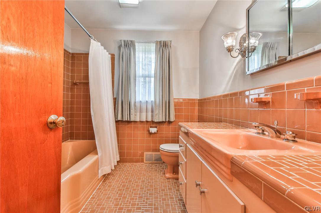 330 Wedgewood Road Bethlehem, PA 18017 - Photo 30 of 47 a bathroom with a sink a toilet a tub and shower