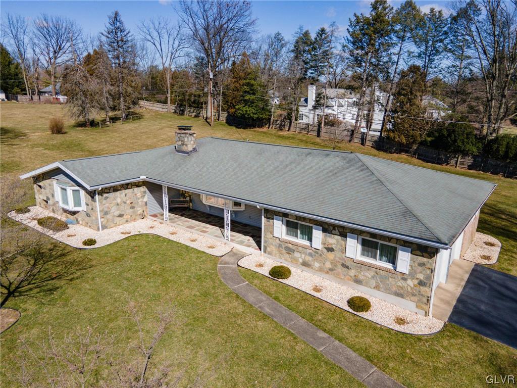 330 Wedgewood Road Bethlehem, PA 18017 - Photo 46 of 47 a view of a house with pool and trees in the background