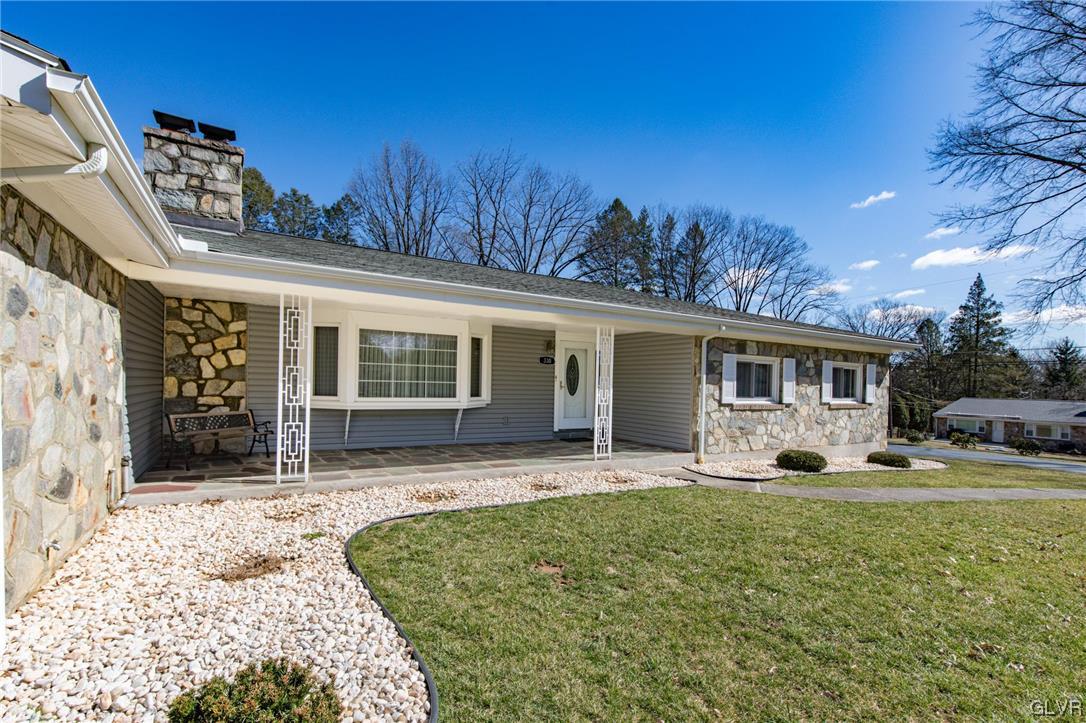 330 Wedgewood Road Bethlehem, PA 18017 - Photo 7 of 47 a front view of a house with garden and trees