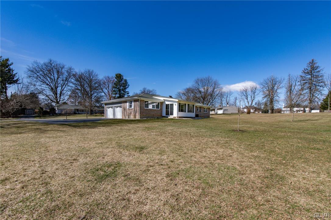 330 Wedgewood Road Bethlehem, PA 18017 - Photo 10 of 47 a front view of a house with a yard