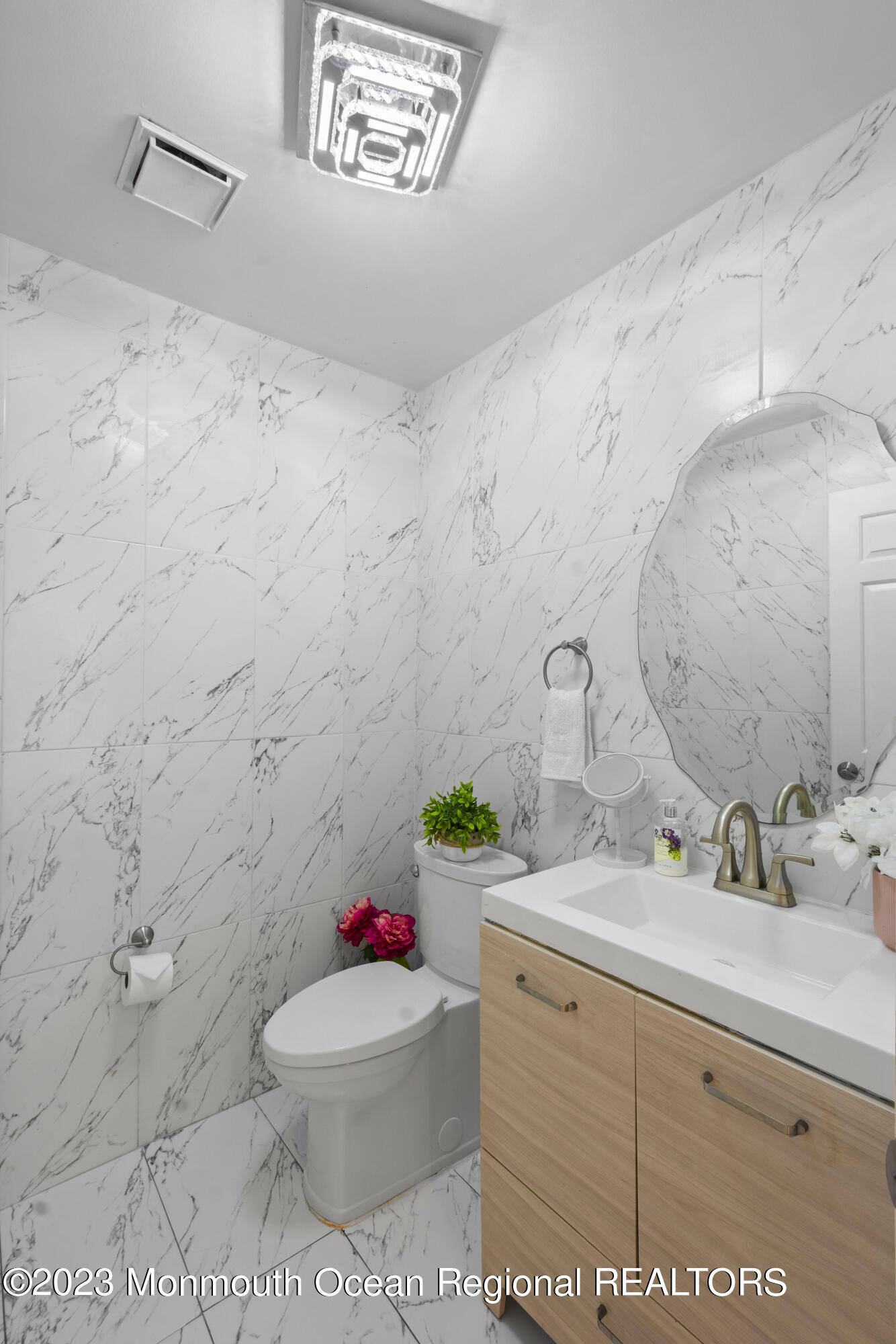758 Anderson Road Jackson, NJ 08527 - Photo 17 of 35 a bathroom with a sink a toilet and a mirror