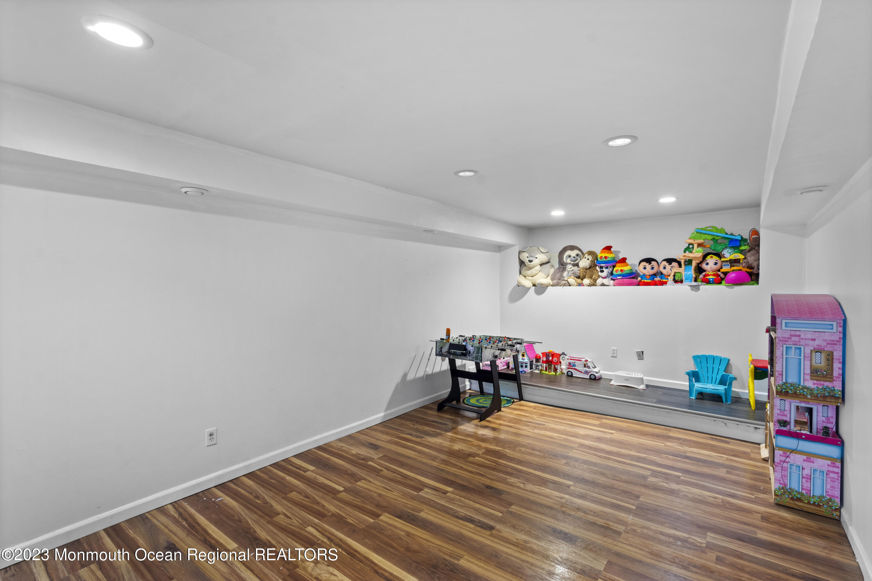 758 Anderson Road Jackson, NJ 08527 - Photo 18 of 35 a room with furniture and a wooden floor