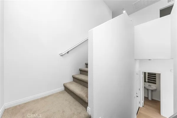 a view of entryway with stairs