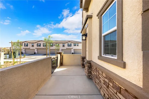 a view of a balcony with city view