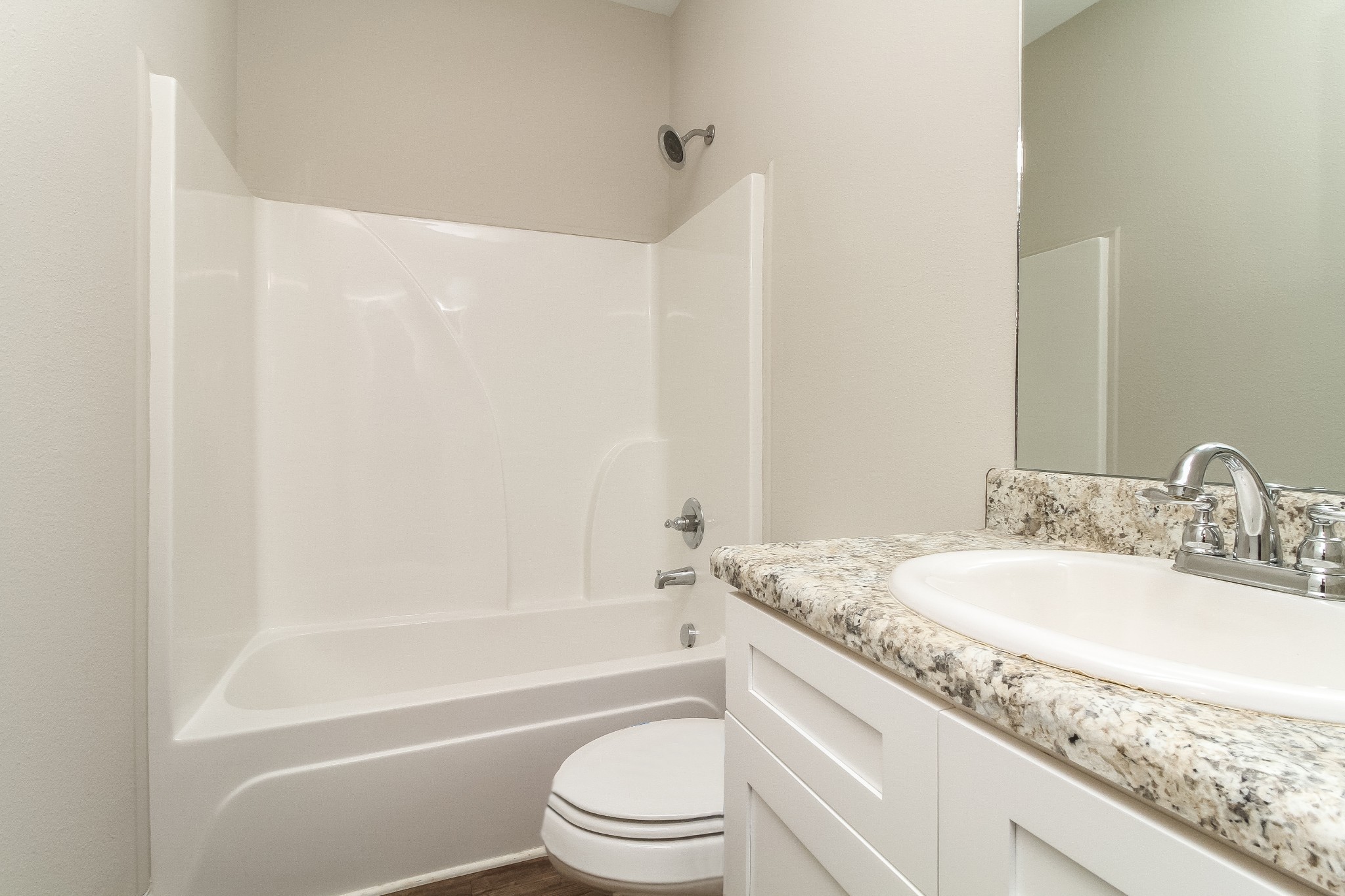 1237 Catawba Way Murfreesboro, TN 37130 - Photo 15 of 18 a bathroom with a granite countertop sink a toilet and bathtub
