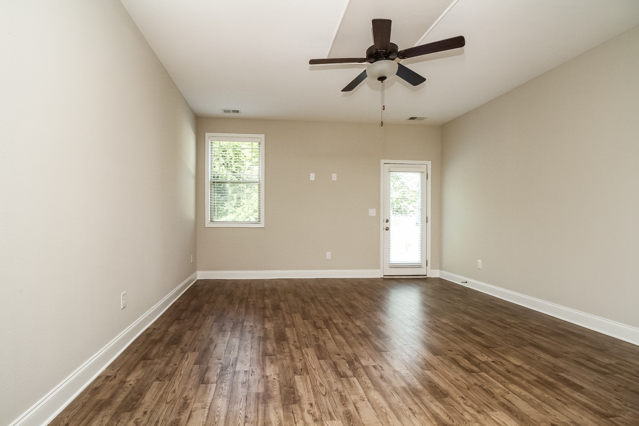 1237 Catawba Way Murfreesboro, TN 37130 - Photo 2 of 18 wooden floor in an empty room with a window