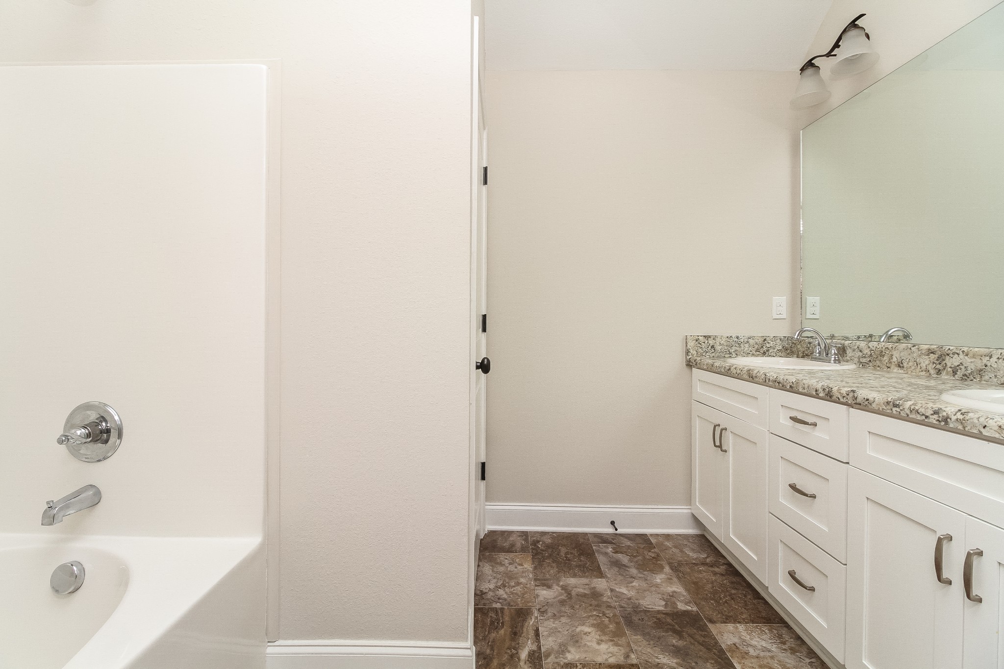 1237 Catawba Way Murfreesboro, TN 37130 - Photo 9 of 18 a bathroom with a granite countertop sink and a bathtub