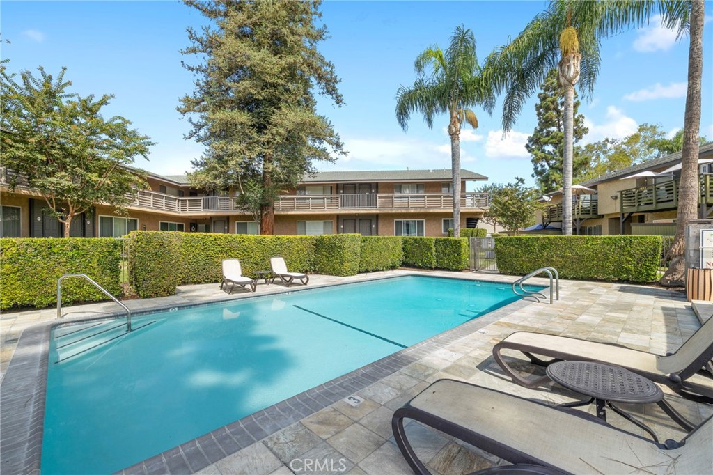 1450 West Lambert Road, Unit 358 La Habra, CA 90631 - Photo 23 of 31 a view of a backyard with a garden and plants