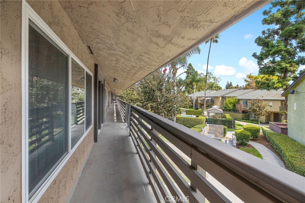 1450 West Lambert Road, Unit 358 La Habra, CA 90631 - Photo 3 of 31 a city view from a balcony with outdoor seating