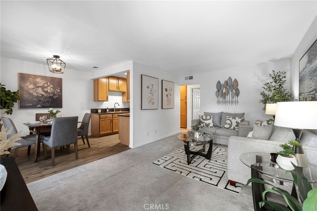 1450 West Lambert Road, Unit 358 La Habra, CA 90631 - Photo 4 of 31 a living room with furniture and a window