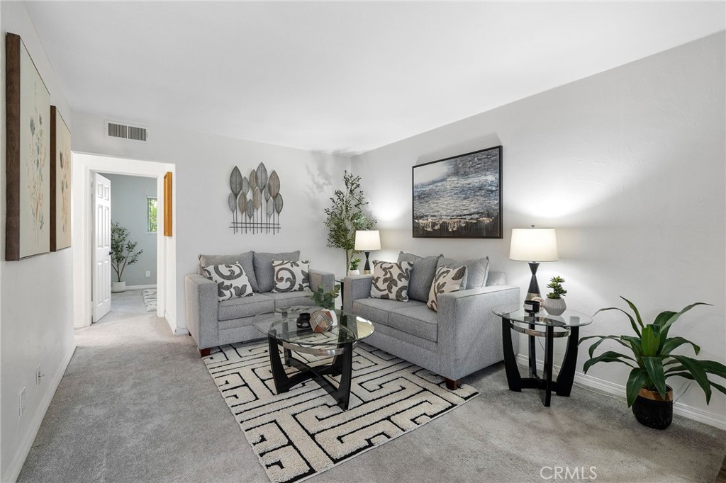 1450 West Lambert Road, Unit 358 La Habra, CA 90631 - Photo 6 of 31 a living room with furniture flowerpot and a potted plant