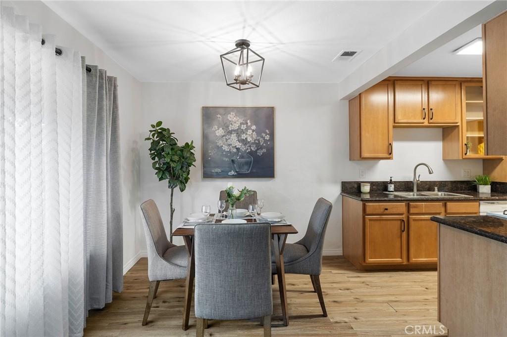 1450 West Lambert Road, Unit 358 La Habra, CA 90631 - Photo 9 of 31 a dining room with furniture and window