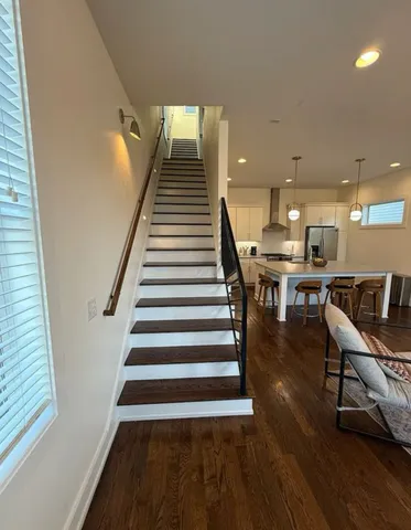 a view of a living room and dining room