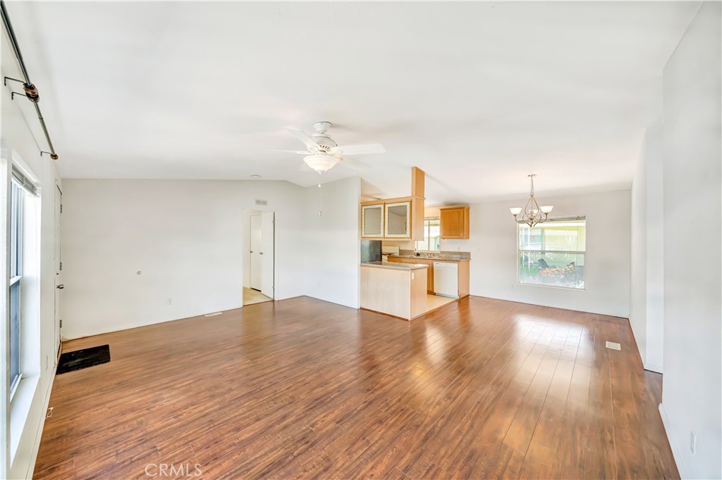 24 Gitana Avenue, Unit 164 Camarillo, CA 93012 - Photo 4 of 52 a view of kitchen with furniture and wooden floor