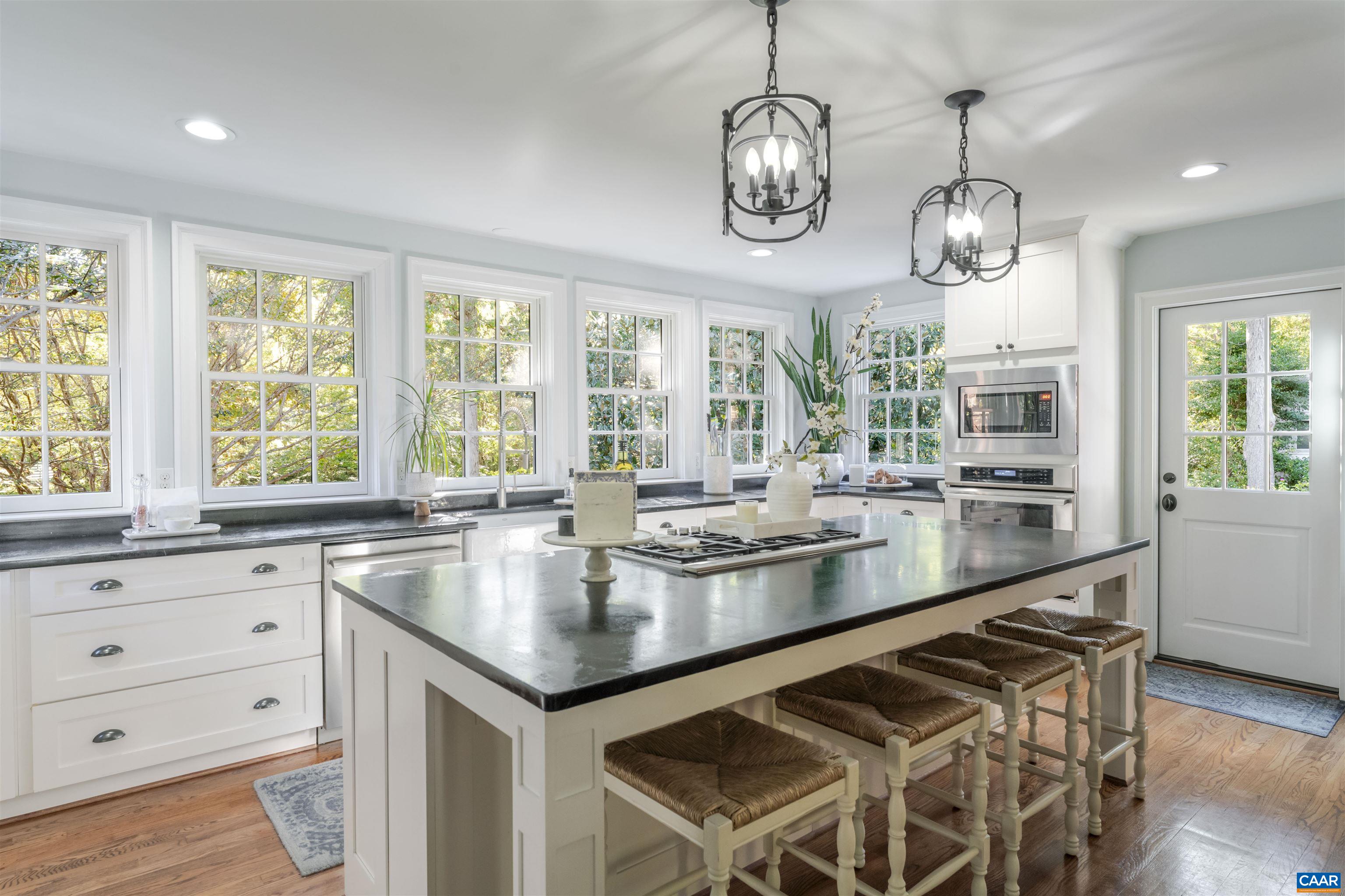 3359 Marsden Point Keswick, VA 22947 - Photo 12 of 47 a large kitchen with a large window and cabinets