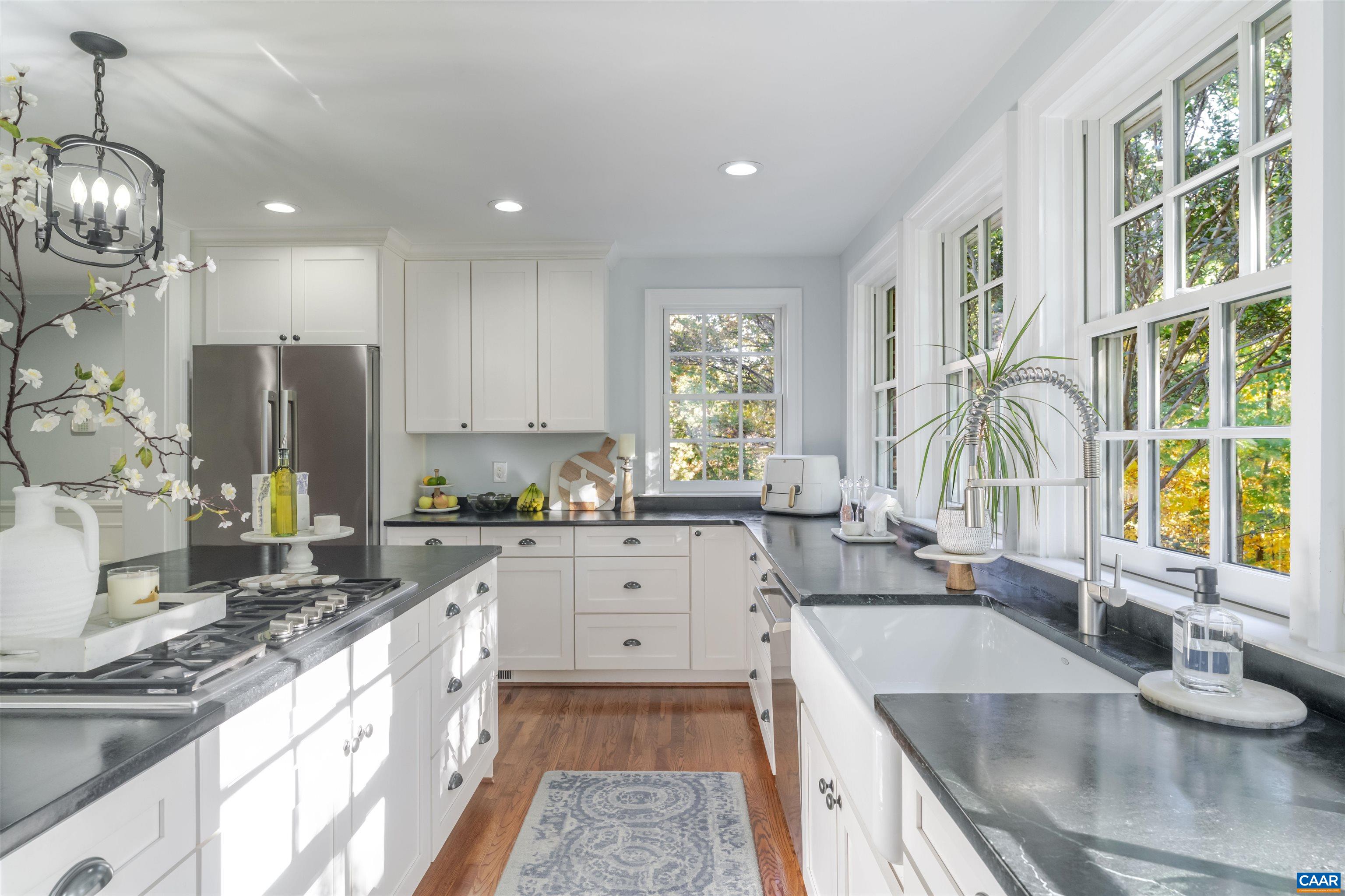 3359 Marsden Point Keswick, VA 22947 - Photo 13 of 47 a large kitchen with granite countertop a large window and a sink