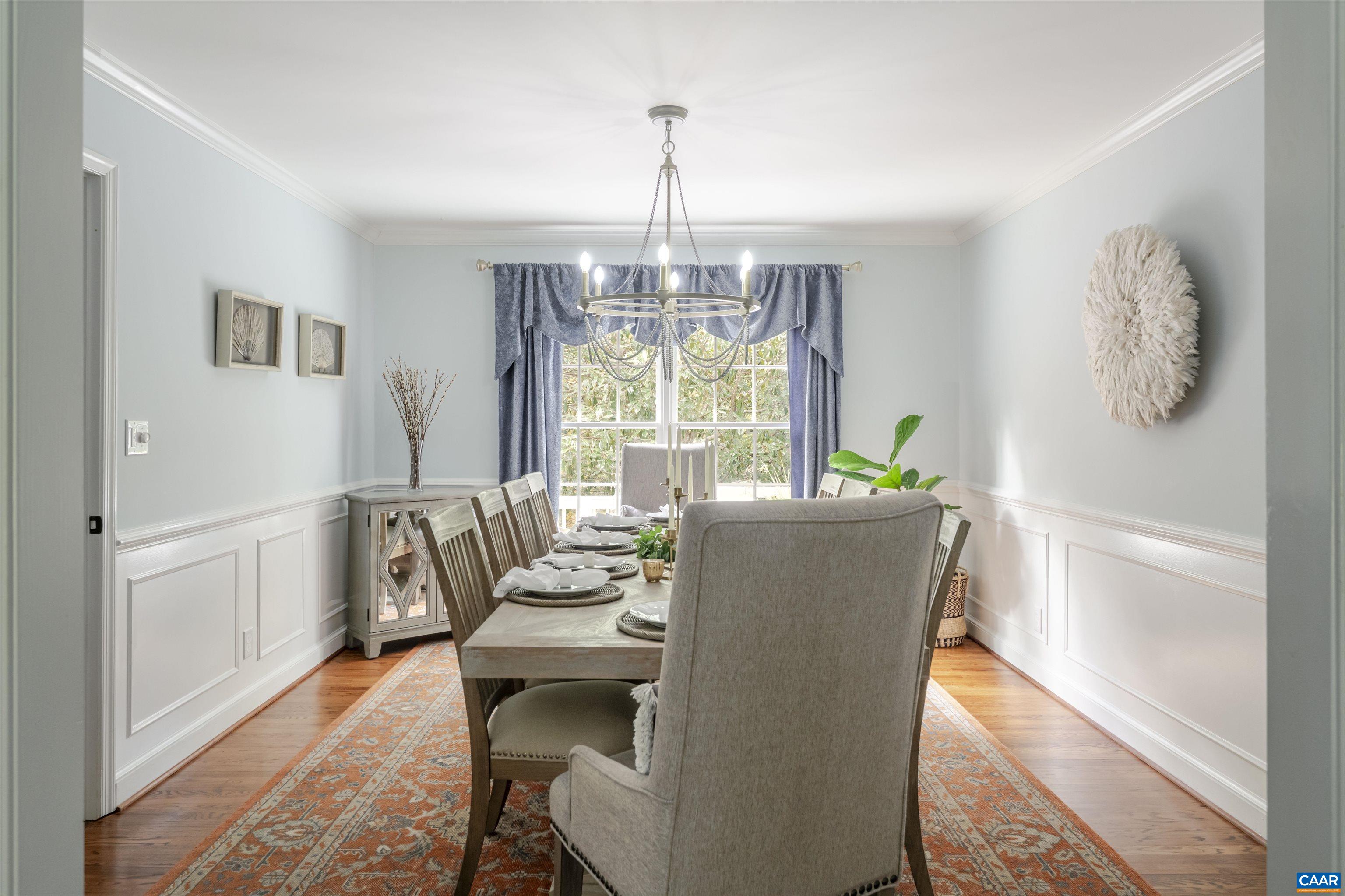 3359 Marsden Point Keswick, VA 22947 - Photo 20 of 47 a dining room with furniture a chandelier and wooden floor
