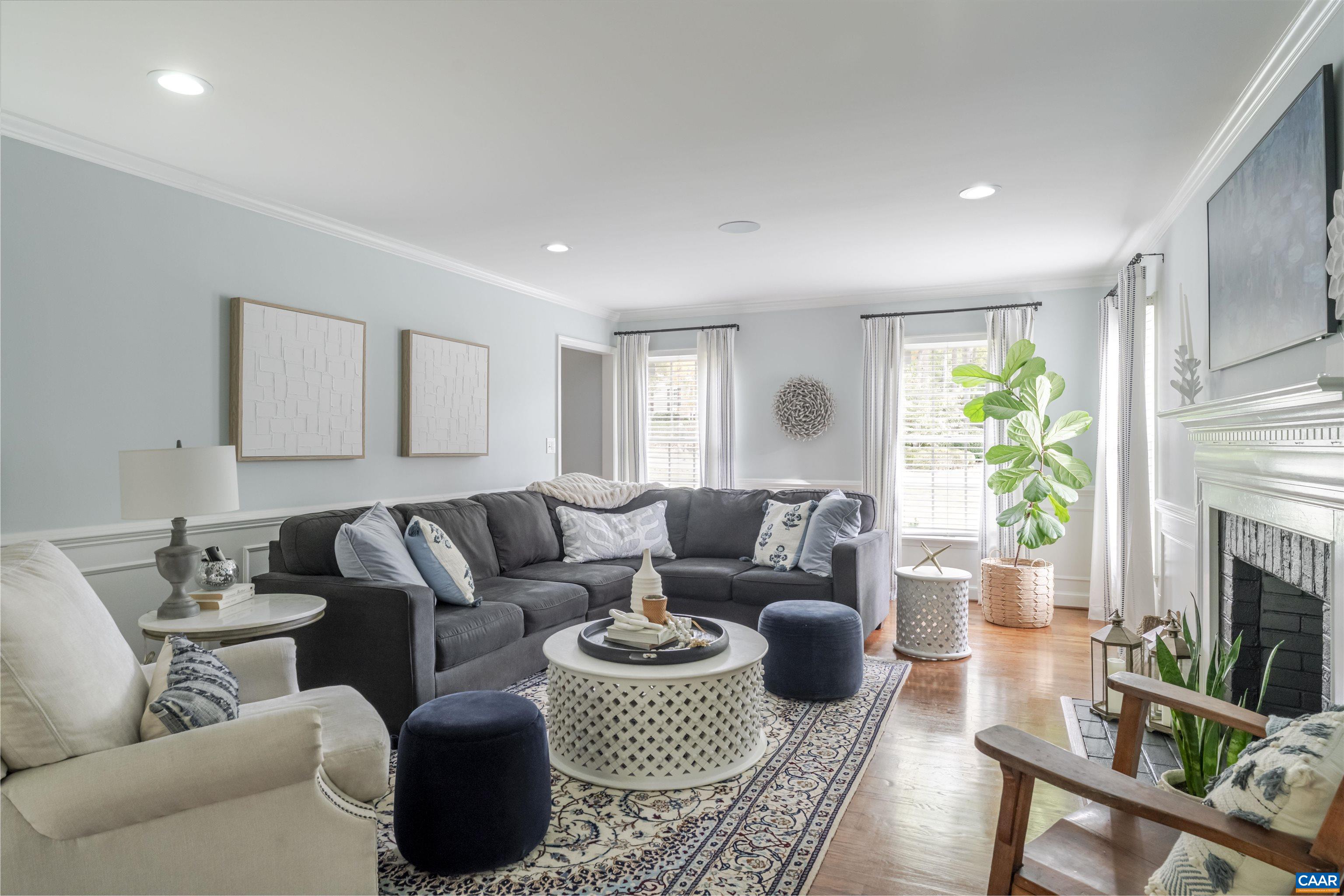 3359 Marsden Point Keswick, VA 22947 - Photo 24 of 47 a living room with furniture a fireplace a potted plant and a window