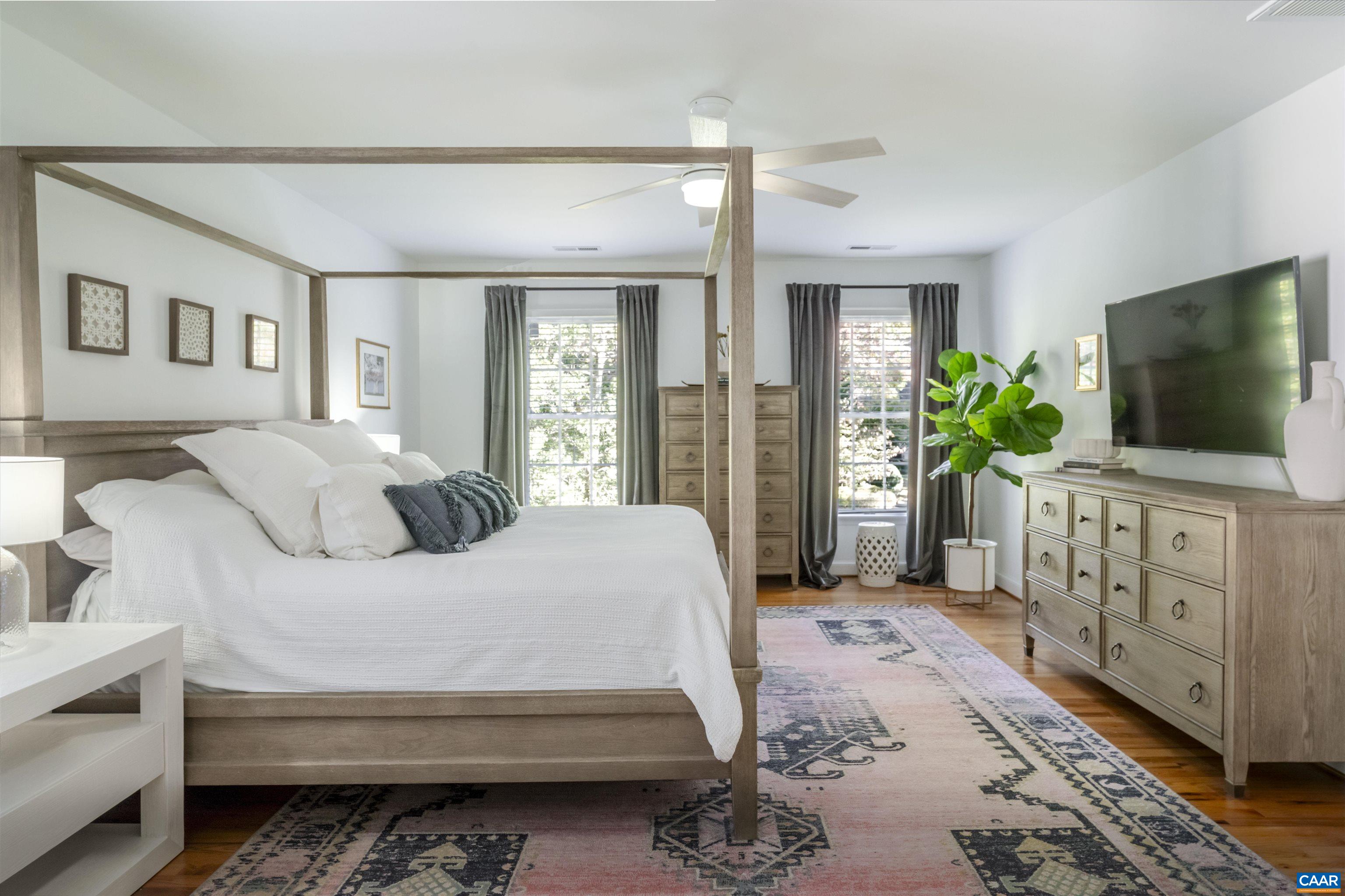 3359 Marsden Point Keswick, VA 22947 - Photo 27 of 47 a bedroom with a bed and a flat screen tv