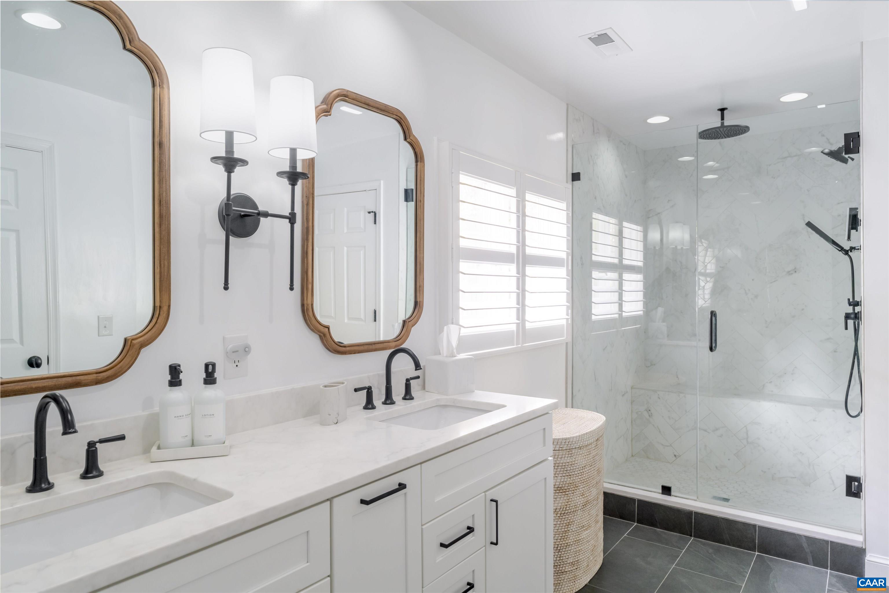 3359 Marsden Point Keswick, VA 22947 - Photo 30 of 47 a bathroom with a double vanity sink mirror double and shower