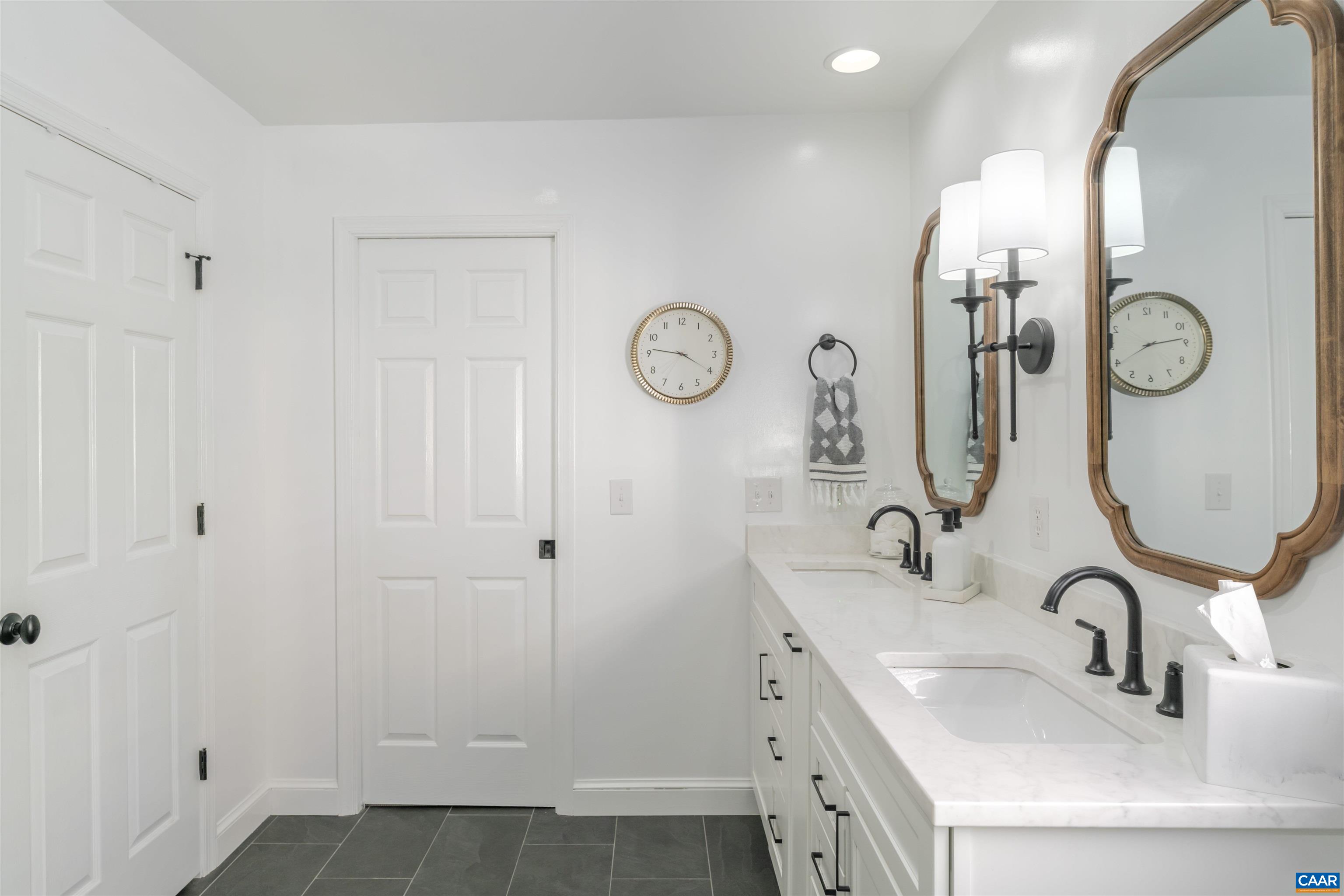 3359 Marsden Point Keswick, VA 22947 - Photo 31 of 47 a bathroom with a sink and a mirror