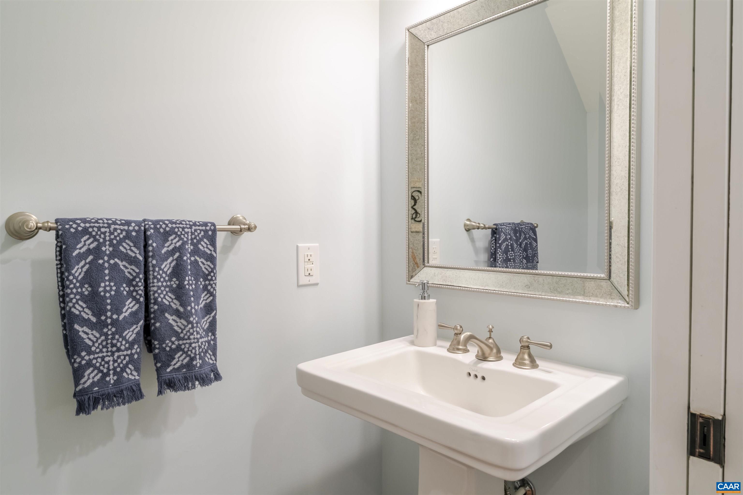 3359 Marsden Point Keswick, VA 22947 - Photo 32 of 47 a bathroom with a sink and a mirror