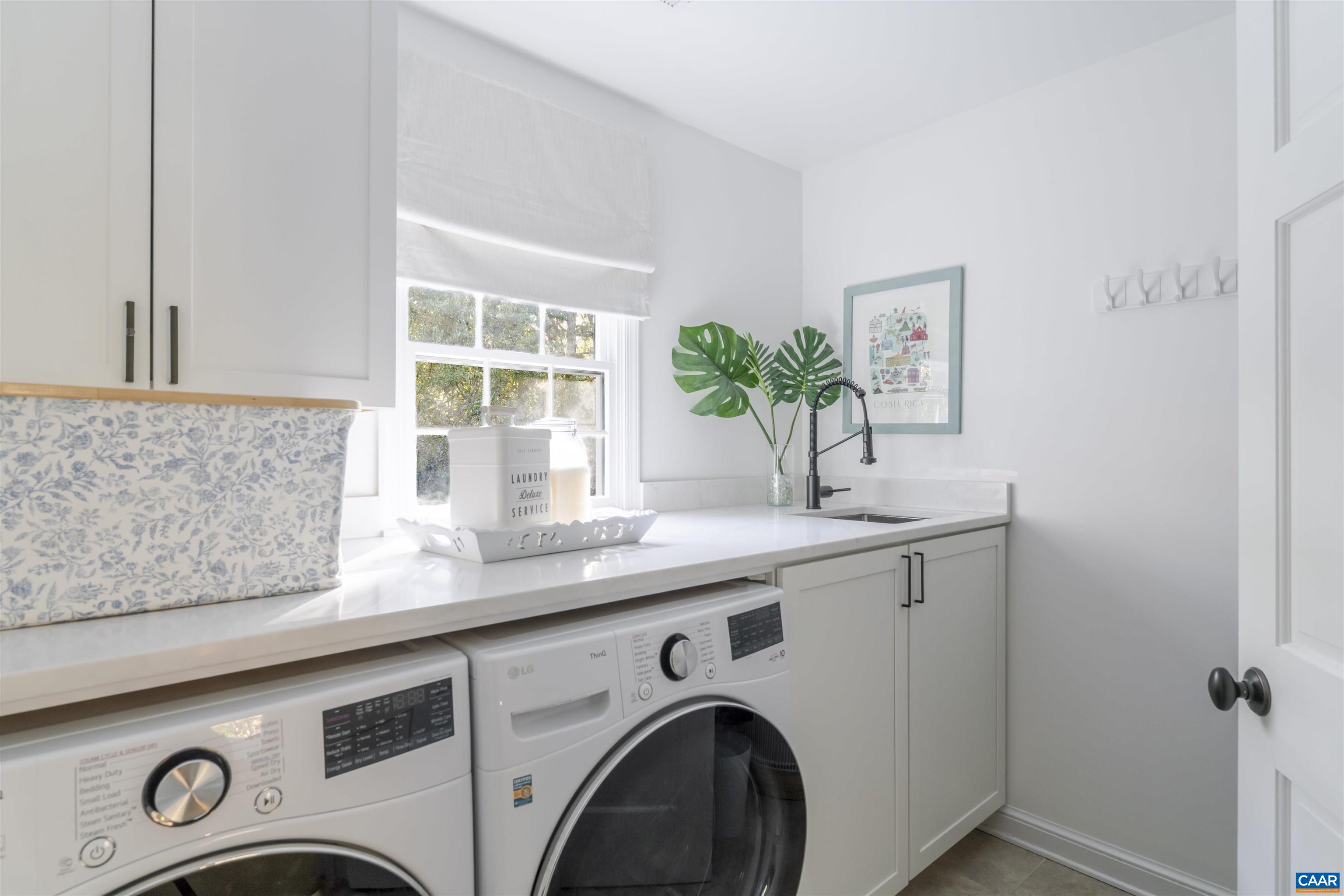 3359 Marsden Point Keswick, VA 22947 - Photo 35 of 47 a utility room with sink washer and dryer