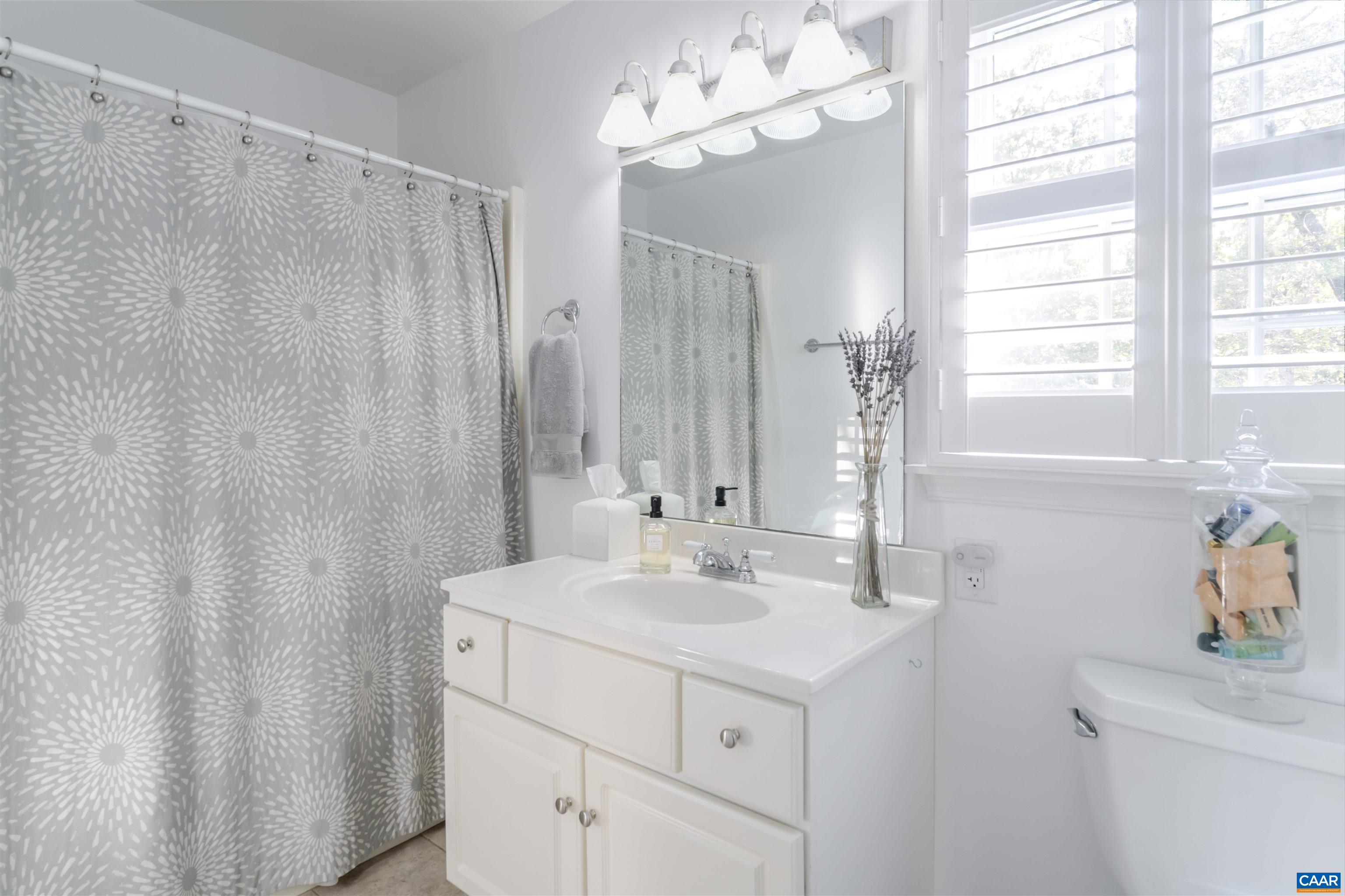 3359 Marsden Point Keswick, VA 22947 - Photo 39 of 47 a bathroom with a sink a double vanity and a mirror