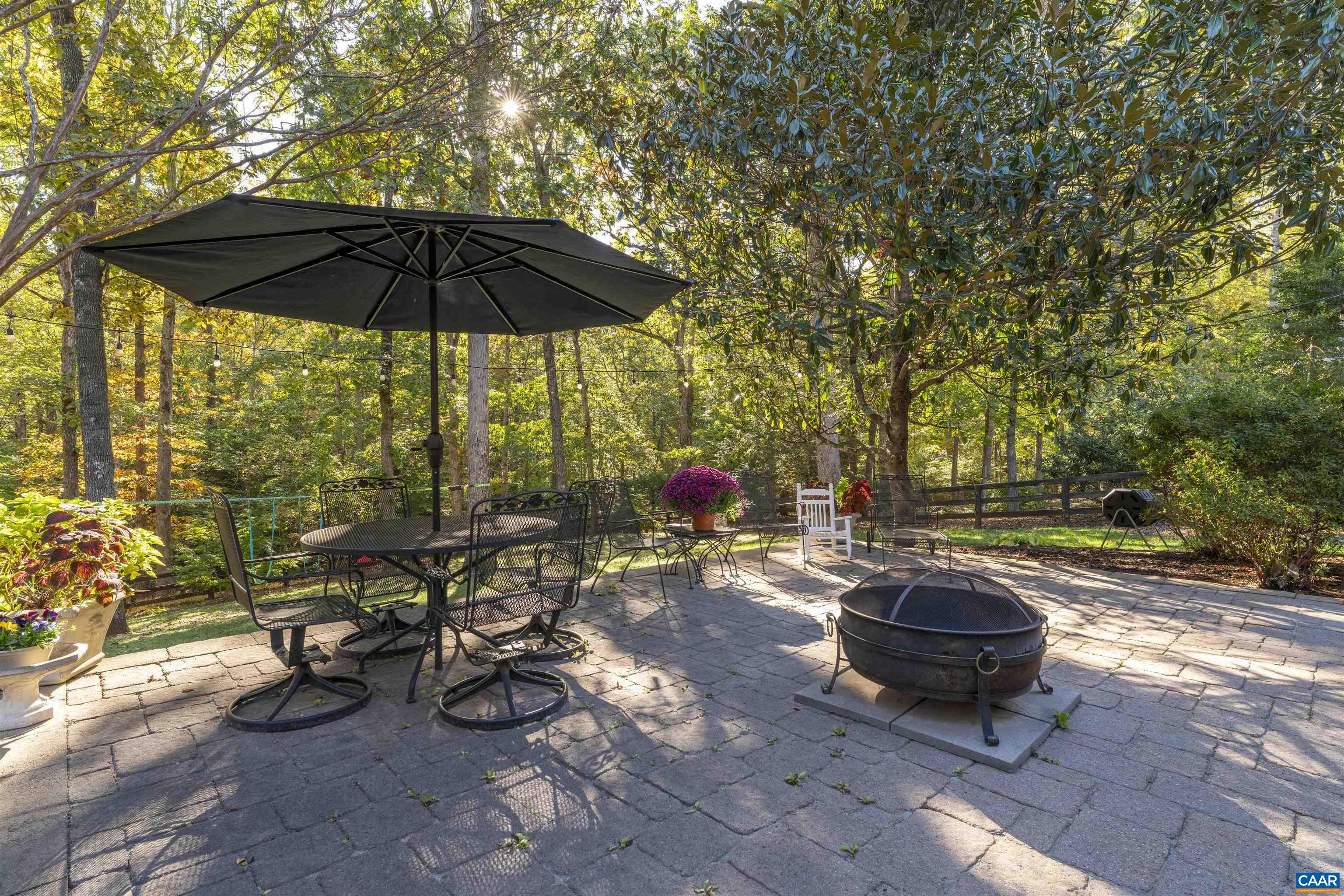 3359 Marsden Point Keswick, VA 22947 - Photo 8 of 47 a view of backyard with outdoor seating and trees